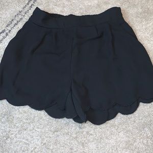 Black scalloped shorts